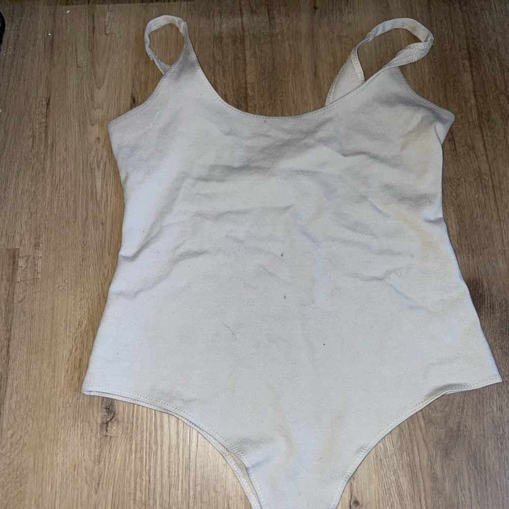 Tan and white body suit deal
